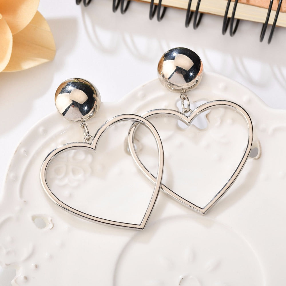 Heart-shaped pendant earrings