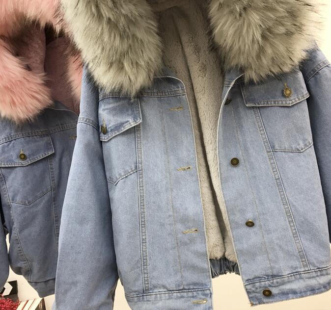 Denim jacket with long sleeves and fur hood