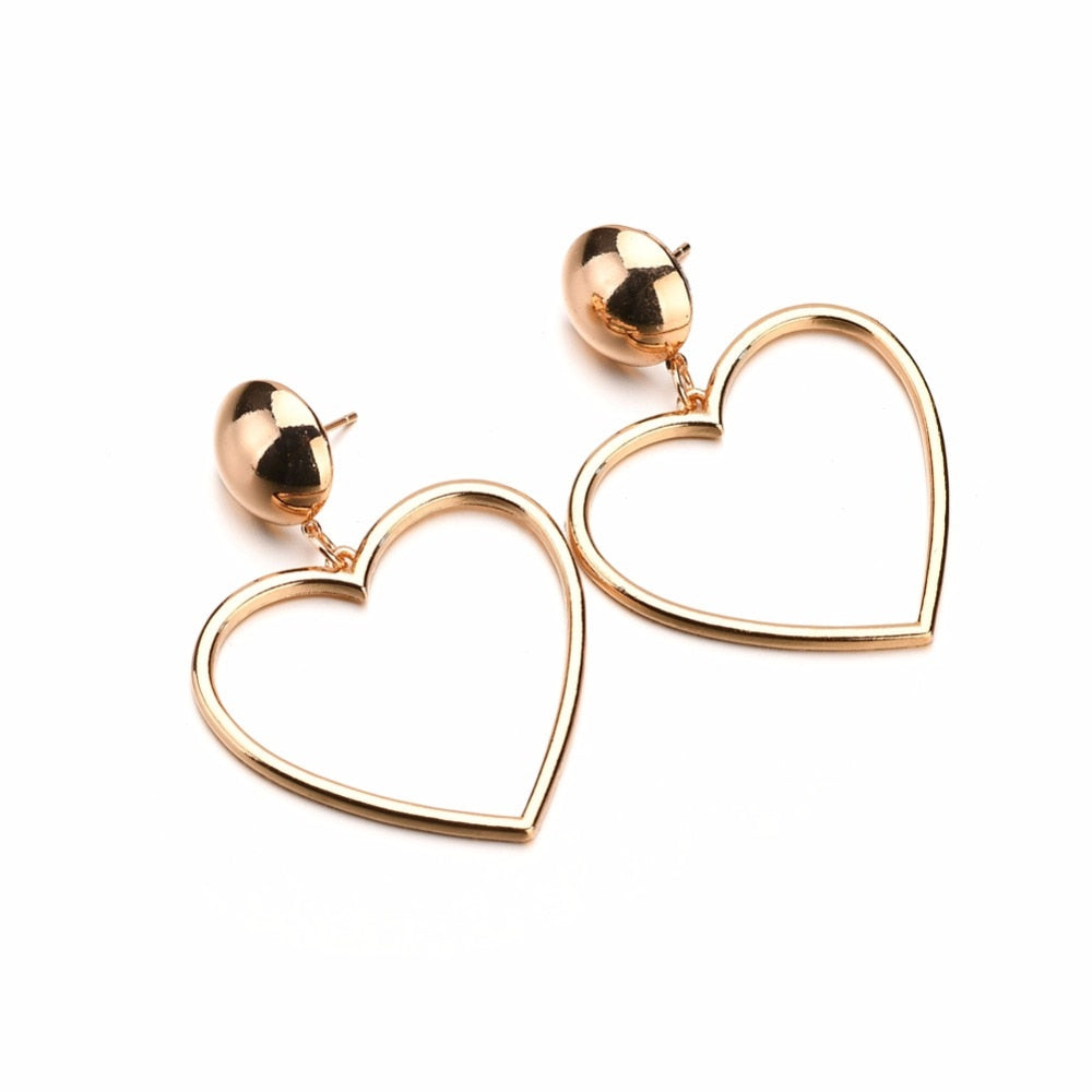 Heart-shaped pendant earrings