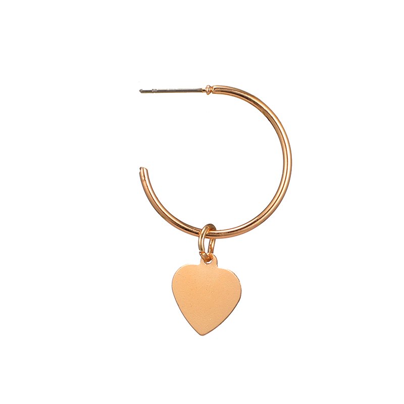 Set of three heart pendant earrings