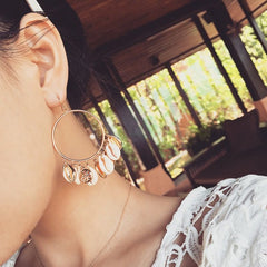 Hoop earrings with pendants