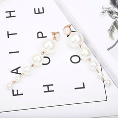 Long earrings with pearls