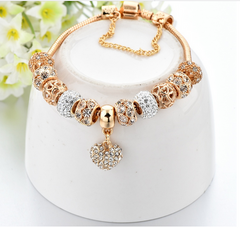 Brilliant bracelet with charms